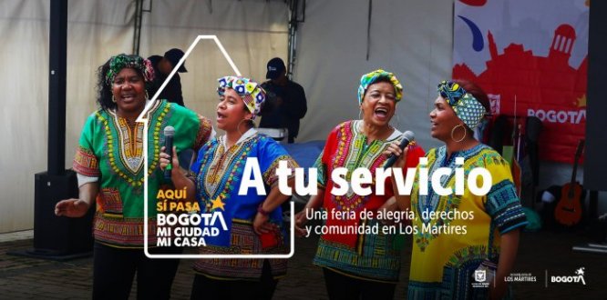 En la imagen se muesta a un grupo de cantadores paticipando en la feria a tu servicio que se desarrolló en la Plaza España. 